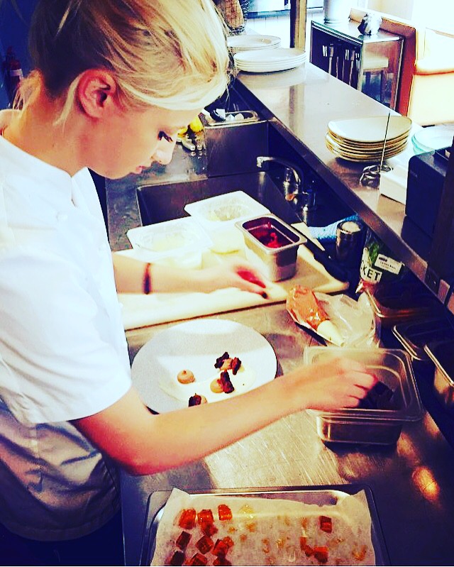 Alessia working in the kitchen